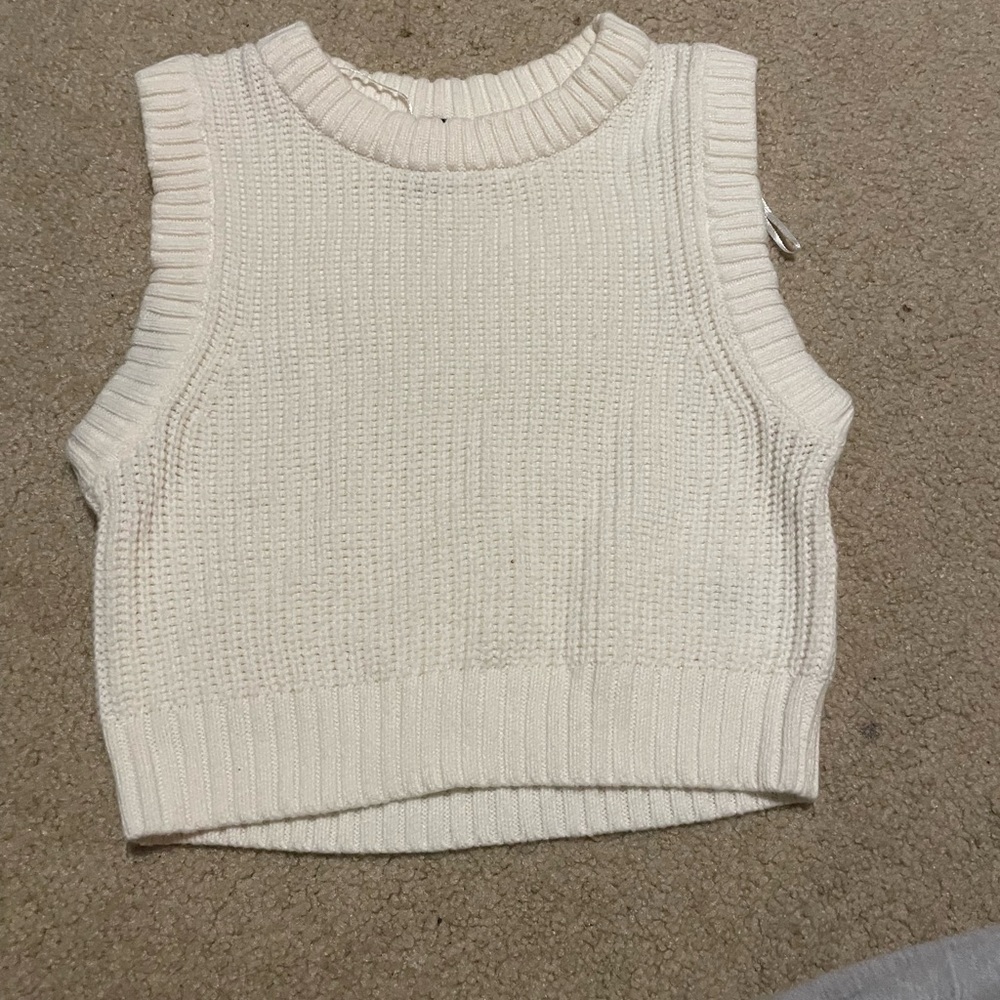 white sweater vest